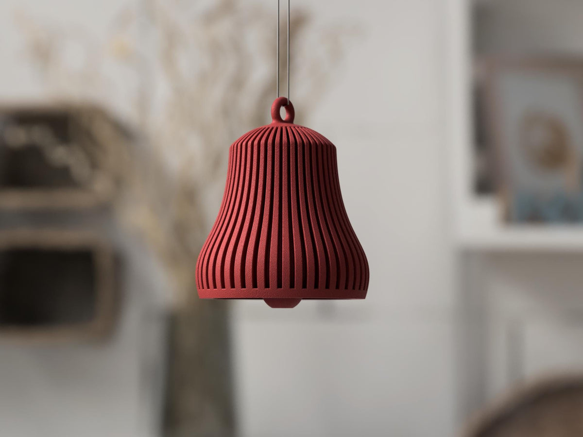 Campana di Natale rossa a coste con batacchio e occhiello superiore.