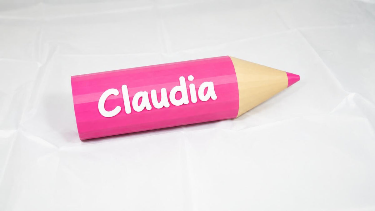 Matita decorativa rosa personalizzata con il nome Claudia in bianco