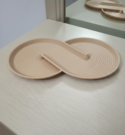 Svuotatasche Infinity beige chiaro, vista della forma a infinito e del bordo in rilievo