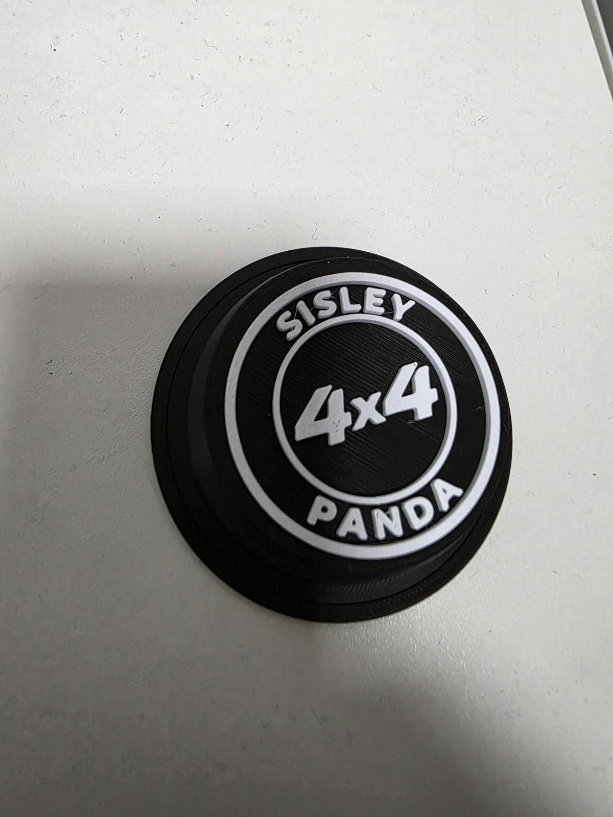 Coprimozzo Panda 4x4 Sisley singolo su fondo bianco, vista d'insieme